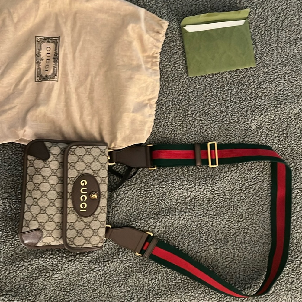 Gucci neo vintage small messenger in GG monogram print with webbed strap.
